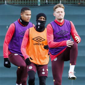Hearts defender Frankie Kent limbers up for Celtic during training on Friday morning.