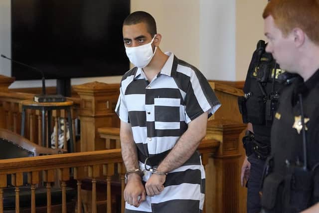 Hadi Matar, 24, center, arrives for an arraignment in the Chautauqua County Courthouse in Mayville, NY. Picture: AP Photo/Gene J. Puskar