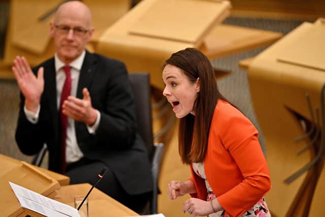 SNP leadership candidate Kate Forbes, applauded by her maternity leave stand-in as finance secretary, John Swinney. Picture: Jeff J Mitchell/Getty Images