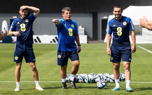 Scotland coach John Carver (centre) with Ryan Christie (left) and John McGinn during Tuesday's training session at Lesser Hampden. (Photo by Alan Harvey / SNS Group)