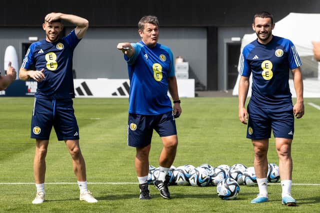 Scotland coach John Carver (centre) with Ryan Christie (left) and John McGinn during Tuesday's training session at Lesser Hampden. (Photo by Alan Harvey / SNS Group)