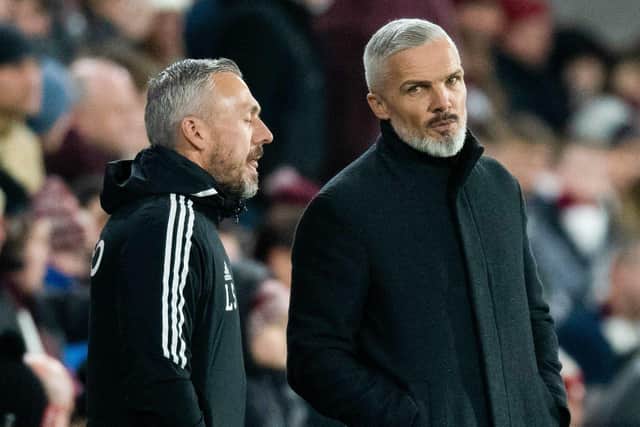 Aberdeen manager Jim Goodwin and his assistant Lee Sharp had a wretched evening at Tynecastle.