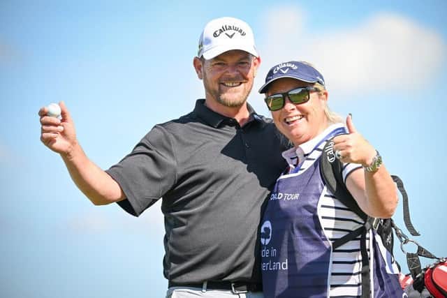 David and wife/caddie Vicky celebrate one of the rare highlights of his 2022 campaign - a hole-in-one during the Made in HimmerLand event in Denmark. Picture: Stuart Franklin/Getty Images.