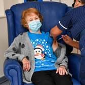 Margaret Keenan, 90, is the first patient in the United Kingdom to receive the Pfizer/BioNtech covid-19 vaccine at University Hospital, Coventry, administered by nurse May Parsons, at the start of the largest ever immunisation programme in the UK's history.