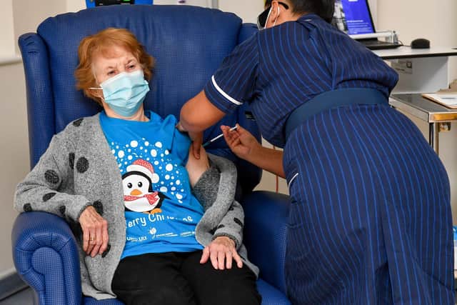 Margaret Keenan, 90, is the first patient in the United Kingdom to receive the Pfizer/BioNtech covid-19 vaccine at University Hospital, Coventry, administered by nurse May Parsons, at the start of the largest ever immunisation programme in the UK's history.