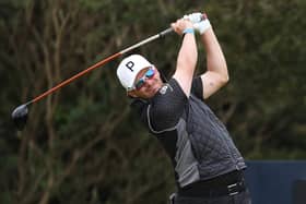 Ewen Ferguson tees off on the 12th hole during day two of the 152nd Open in Ayrshire. Picture: Warren Little/Getty Images.