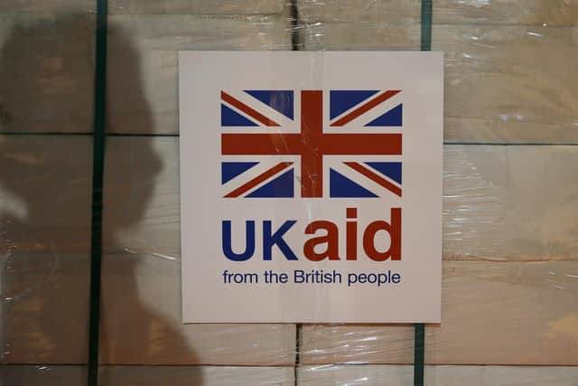 A UK aid label is attached to a box containing kitchen sets at a UK aid Disaster Response Centre at Kemble Airport, Wiltshire.