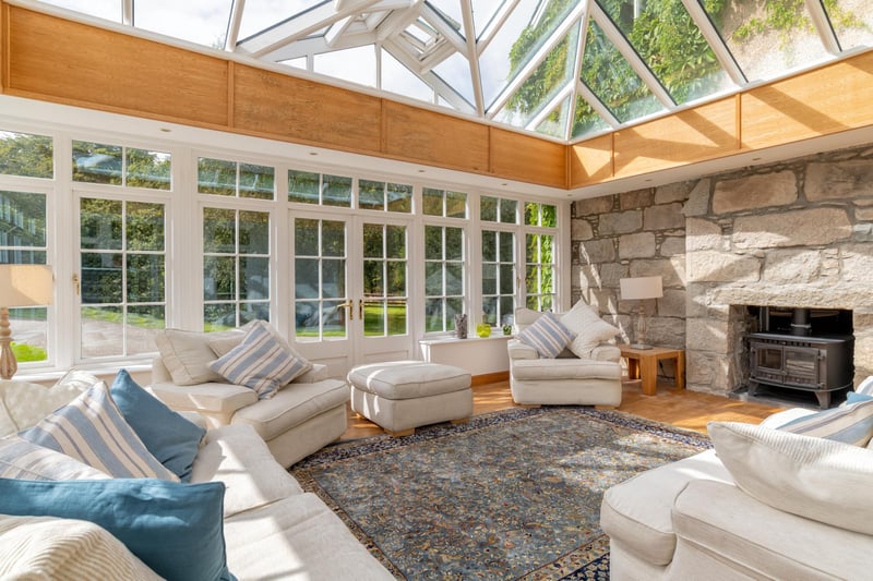 There is a beautiful orangery with views looking over the garden. Approximately 43 acres of grounds used as a nature reserve for the last two decades, sweeping driveways, patio, log store, plus the two-bedroom coach house.