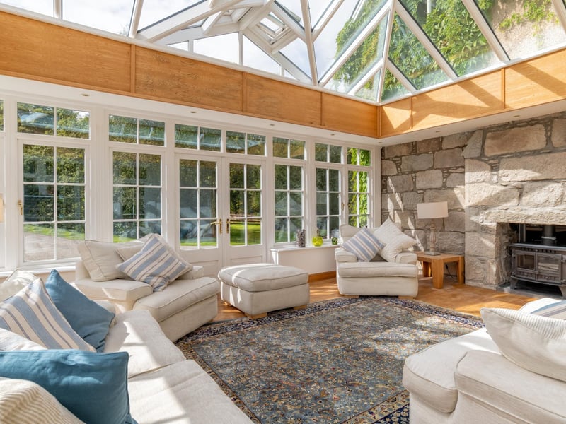 There is a beautiful orangery with views looking over the garden. Approximately 43 acres of grounds used as a nature reserve for the last two decades, sweeping driveways, patio, log store, plus the two-bedroom coach house.