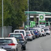Cars queue for fuel at a BP petrol station in Bracknell, Berkshire, on Sunday. Picture: Steve Parsons/PA Wire