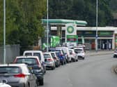 Cars queue for fuel at a BP petrol station in Bracknell, Berkshire, on Sunday. Picture: Steve Parsons/PA Wire