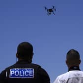 The use of drones and other forms of technology to monitor the public raise serious questions about human rights (Picture: Petros Karadjias/AP)