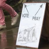 Voters would be required to show photographic identification if new laws are passed (Picture: Lesley Martin/AFP via Getty Images)
