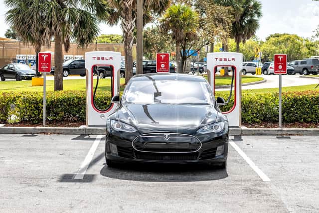 Sales of pure electric vehicles such as Tesla cars have been a bright spot but even those have been impacted by parts shortages and delivery delays.