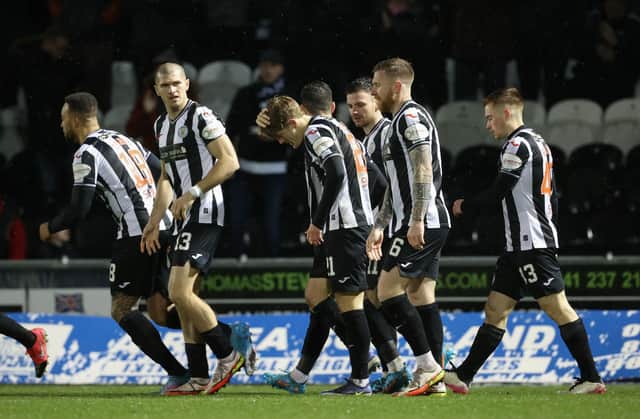 St Mirren's Alex Grieve celebrates making it 2-1 with teammates during a cinch Premiership match between St. Mirren and St Johnstone at the SMISA Stadium, on February 09, 2022, in Paisley, Scotland.