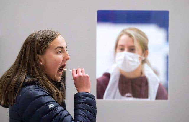 Swab testing as previously done by Edinburgh university students. The new tests will use saliva samples.