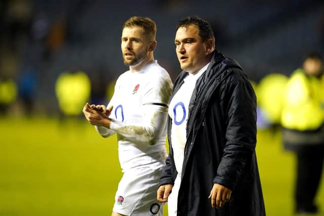 England's Jamie George (right) and Henry Slade appear dejected following defeat by Scotland.