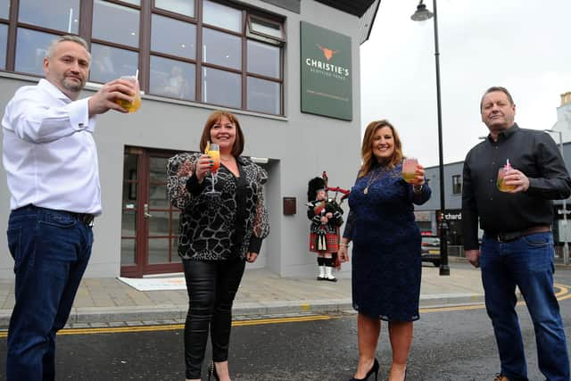 Scottish tapas restaurant Christie's launched in Falkirk on Wednesday. Pictured are owner David Blackwood, business partner Yvonne Latta, fellow owner Tom Malloy and singer Barbara Bryceland (centre, right). Picture: Michael Gillen.