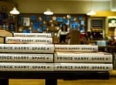 The tell all book by Prince Harry titled Spare, goes on sale worldwide to the public today. Staff at Watrerstones, Princes Street, Edinburgh put the book out on display and also sort the window display