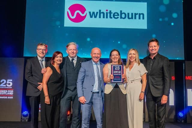 Eve McCurrich, Managing Director of Whiteburn and members of her team accepting the SME Homebuilder of the Year Award at this year’s Homes for Scotland.