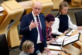 John Swinney speaks during First Minister's Questions at Scottish Parliament Building last week (Picture: Jeff J Mitchell/Getty Images)