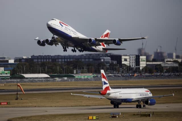 A British Airways plane takes off from Heathrow Airport's Terminal 5 (Picture: Tolga Akmen/AFP via Getty Images)