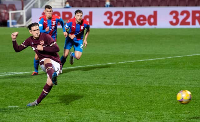 Jamie Walker's penalty was enough for Hearts to beat Inverness.