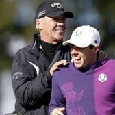 Rory McIlroy shares a joke with coach Pete Cowen during a practice round ahead of the 2014 Ryder Cup at Gleneagles. Picture: Adrian Dennis/AFP via Getty Images.