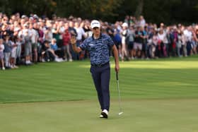 Matteo Manassero celebrates holing a birdie putt on the 18th green during day three of the BMW PGA Championship at Wentworth Club. Picture: Warren Little/Getty Images.