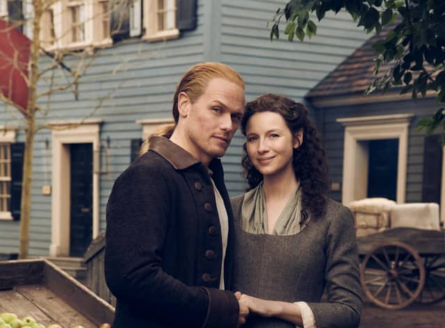 Actors Sam Heughan and Caitriona Balfe in the hit adaptation of the Outlander books, which have sold 25million copies worldwide. PIC: Jason Bell/2021 Starz Entertainment.