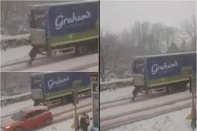 Charlene Leslie attempted to push a milk lorry up a snowy hill in Fife. Picture: Fife Jammers