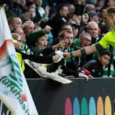 Joe Hart is already a favourite with the Celtic support, and the affinity could be witnessed in the keeper giving his top to a fan following Celtic's win over Ferencvaros on Tuesday. (Photo by Ross Parker / SNS Group)