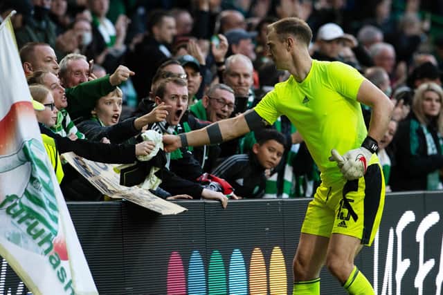 Joe Hart is already a favourite with the Celtic support, and the affinity could be witnessed in the keeper giving his top to a fan following Celtic's win over Ferencvaros on Tuesday. (Photo by Ross Parker / SNS Group)