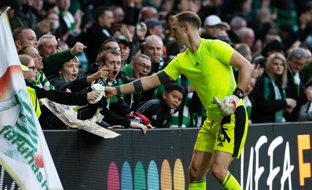 Joe Hart is already a favourite with the Celtic support, and the affinity could be witnessed in the keeper giving his top to a fan following Celtic's win over Ferencvaros on Tuesday. (Photo by Ross Parker / SNS Group)