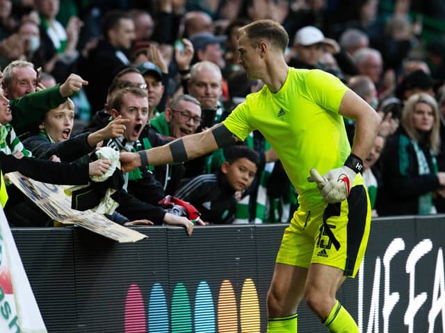 Joe Hart is already a favourite with the Celtic support, and the affinity could be witnessed in the keeper giving his top to a fan following Celtic's win over Ferencvaros on Tuesday. (Photo by Ross Parker / SNS Group)