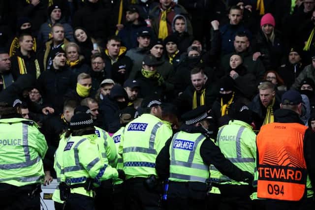 Police officers had to move in to restore order among the travelling Borussia Dortmund fans before kick-off at Ibrox. (Photo by Alan Harvey / SNS Group)
