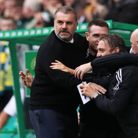 Celtic manager Ange Postecoglu celebrates with backroom staff after his side take the lead against St Mirren. (Photo by Craig Williamson / SNS Group)