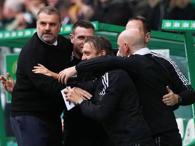 Celtic manager Ange Postecoglu celebrates with backroom staff after his side take the lead against St Mirren. (Photo by Craig Williamson / SNS Group)