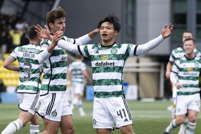 Reo Hatate celebrates after putting Celtic ahead from the penalty spot. (Photo by Paul Devlin / SNS Group)