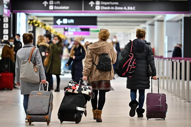 The new scanners will ease restrictions on liquids in hand luggage. (Photo by Jeff J Mitchell/Getty Images)