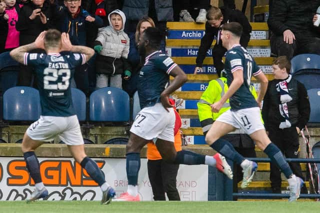 Raith Rovers' Esmael Goncalves celebrates with Dylan Easton and Connor McBride after scoring to make it 3-1 during a Scottish Cup match between Raith Rovers and Motherwell at Stark's Park, on February 11, 2023, in Kirkcaldy, Scotland. (Photo by Craig Foy / SNS Group)