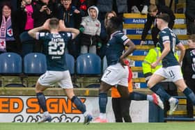Raith Rovers' Esmael Goncalves celebrates with Dylan Easton and Connor McBride after scoring to make it 3-1 during a Scottish Cup match between Raith Rovers and Motherwell at Stark's Park, on February 11, 2023, in Kirkcaldy, Scotland. (Photo by Craig Foy / SNS Group)