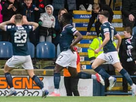 Raith Rovers' Esmael Goncalves celebrates with Dylan Easton and Connor McBride after scoring to make it 3-1 during a Scottish Cup match between Raith Rovers and Motherwell at Stark's Park, on February 11, 2023, in Kirkcaldy, Scotland. (Photo by Craig Foy / SNS Group)