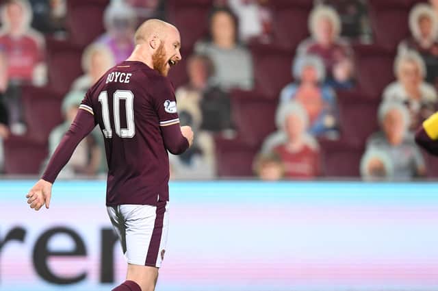 Liam Boyce netted twice for Hearts against Queen of the South.