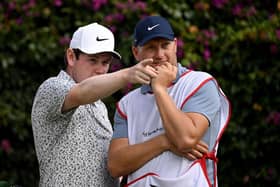 Bob MacIntyre picks out a line with his caddie Mike Thomson on the 18th tee in the second round of the Magical Kenya Open Presented by Absa at Muthaiga Golf Club in Nairobi. Picture: Stuart Franklin/Getty Images.