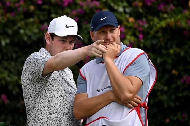 Bob MacIntyre picks out a line with his caddie Mike Thomson on the 18th tee in the second round of the Magical Kenya Open Presented by Absa at Muthaiga Golf Club in Nairobi. Picture: Stuart Franklin/Getty Images.