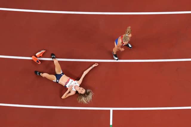 Eilish McColgan lies flat out after a gruelling 10,000m at the Tokyo Olympics. Picture: Rob Carr/Getty Images