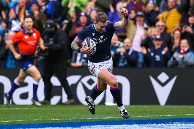 The celebrations start early for Stuart Hogg as he crosses the line to score against Japan, his 25th try for Scotland. (Photo by Craig Williamson / SNS Group)