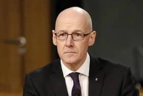 John Swinney has announced delay to education review