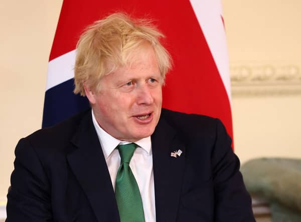 Boris Johnson is facing fresh accusations he lied to Parliament after photographs emerged of him raising a glass at a Downing Street leaving party during lockdown.